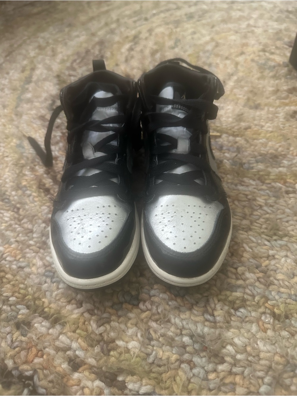 Jordan 1 Mid SE Kids Black and Silver High-Top Sneakers